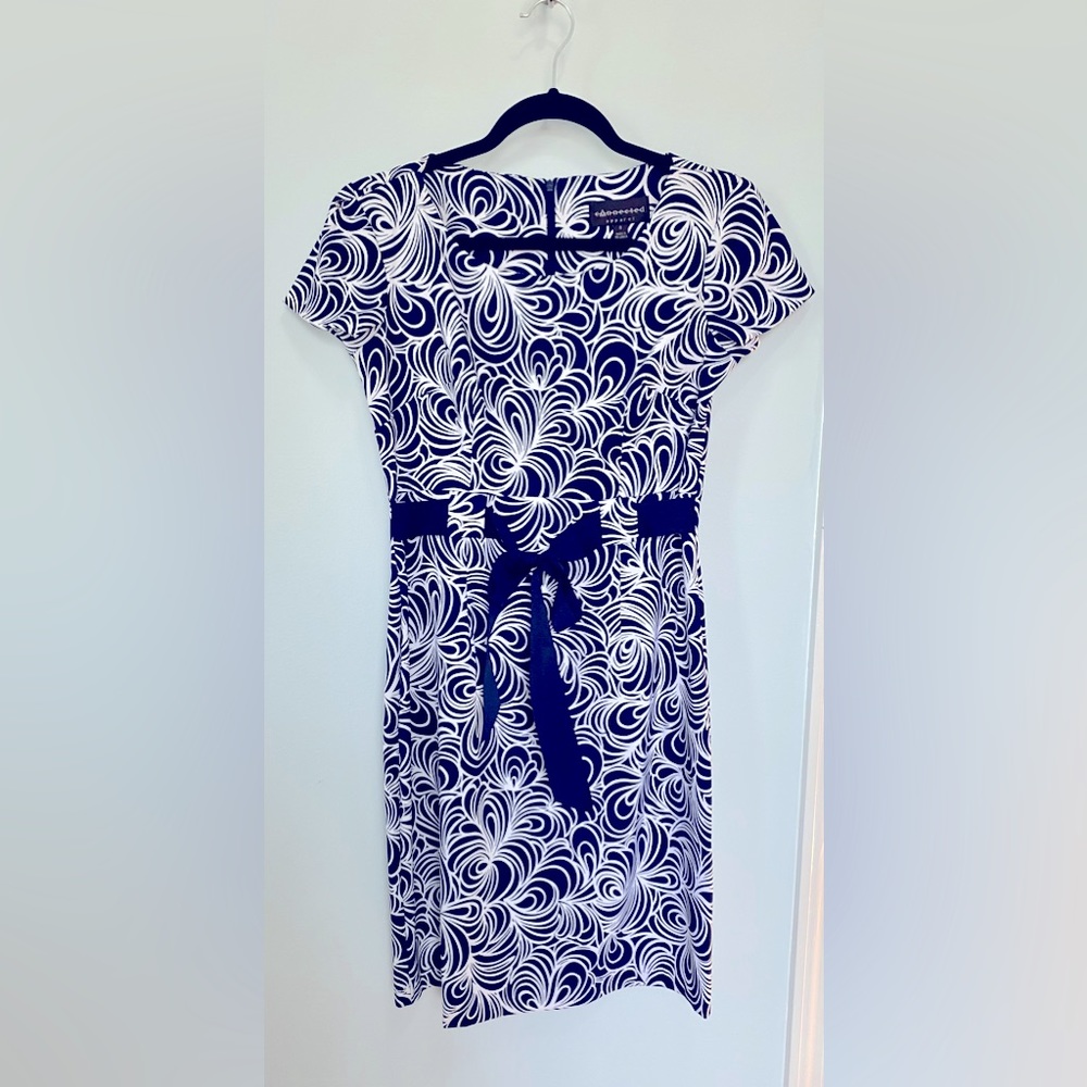 Very cute retro navy blue and white dress.